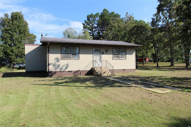 ranch-style home with a front yard