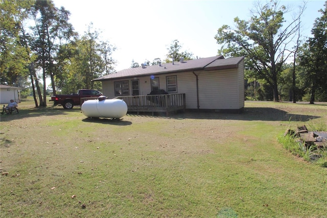 view of yard with a wooden deck