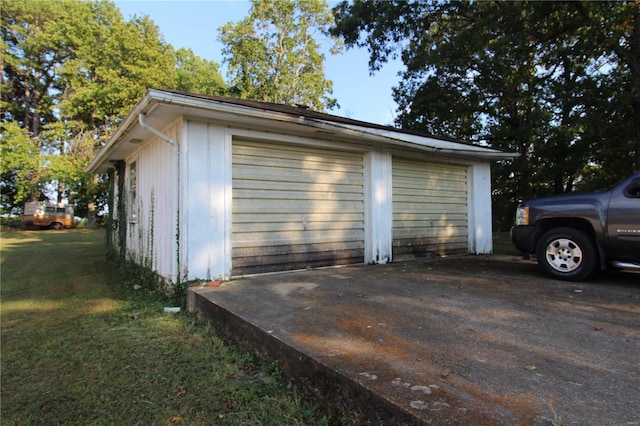 garage with a yard