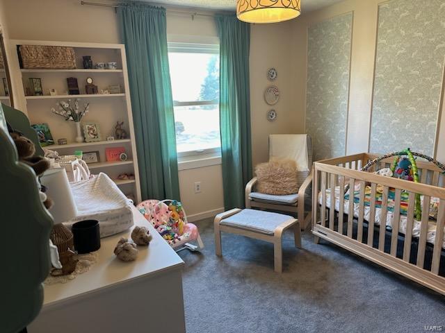 bedroom featuring carpet