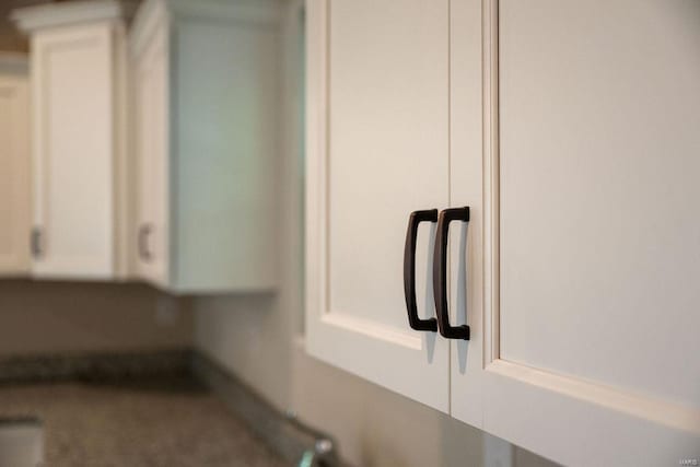 details featuring white cabinets