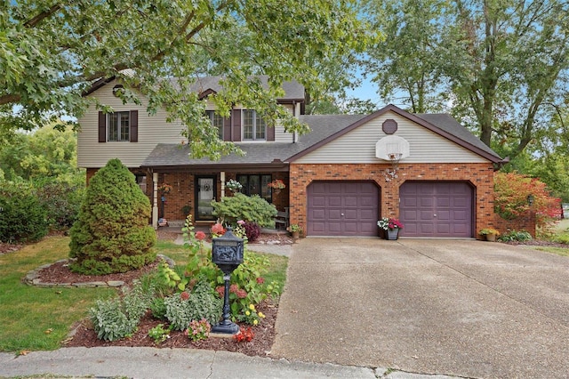 view of front of property with a garage