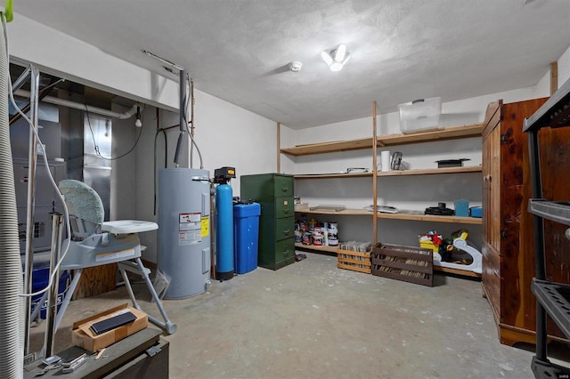 basement with a textured ceiling and water heater