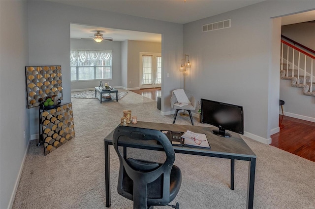 home office with ceiling fan and wood-type flooring