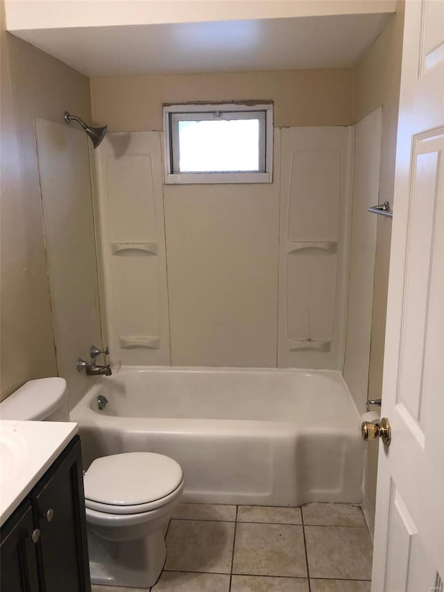 full bathroom with shower / tub combination, vanity, toilet, and tile patterned floors