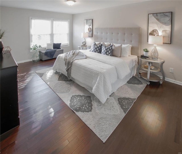 bedroom featuring dark wood-type flooring