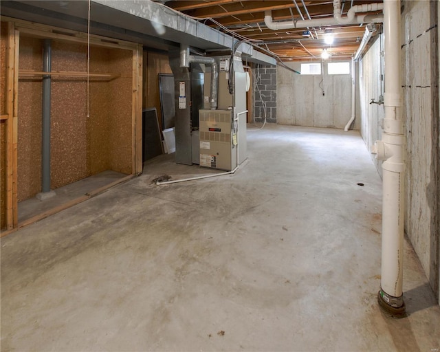 basement featuring heating unit