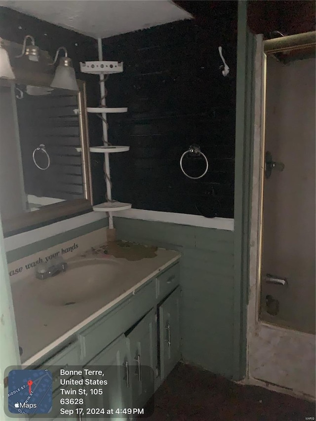 bathroom with  shower combination and vanity