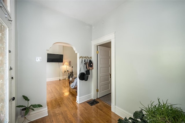 corridor featuring hardwood / wood-style flooring