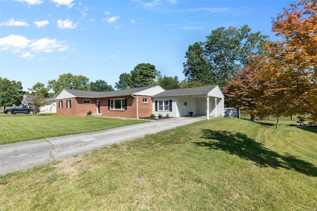 ranch-style home with a front lawn and a carport