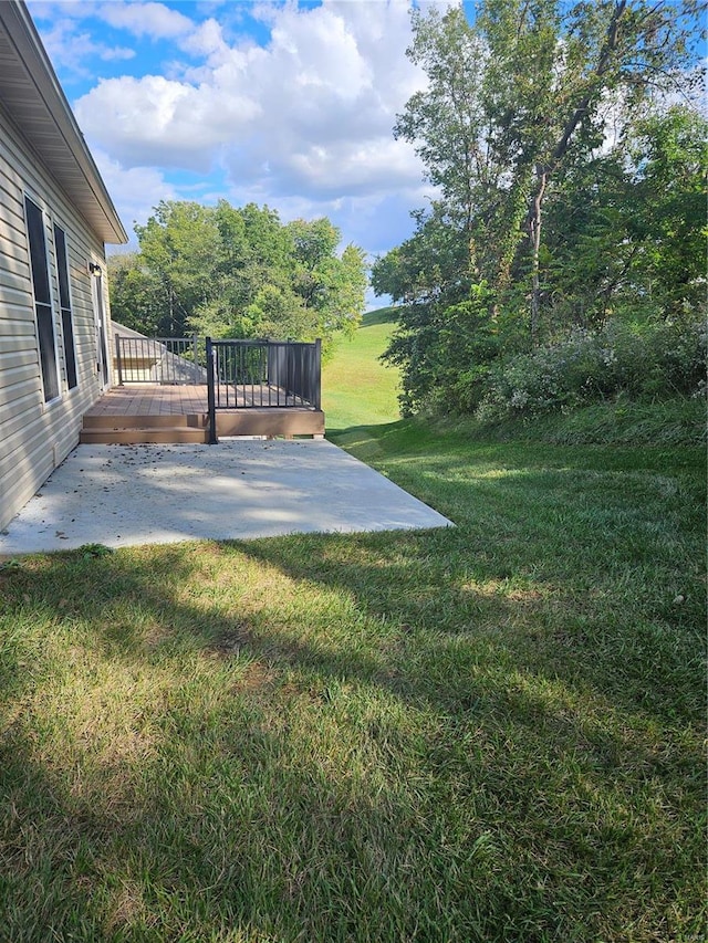 view of yard featuring a deck