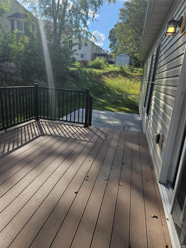 deck featuring a storage shed