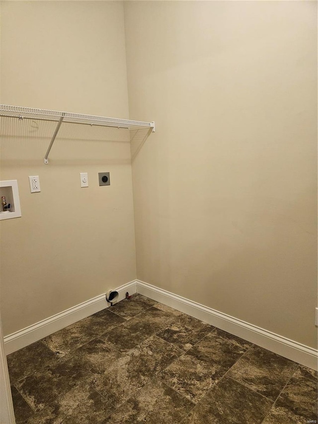 clothes washing area featuring hookup for a washing machine and electric dryer hookup