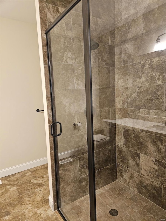 bathroom featuring an enclosed shower