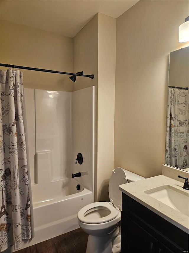 full bathroom featuring shower / bath combo, vanity, toilet, and hardwood / wood-style floors