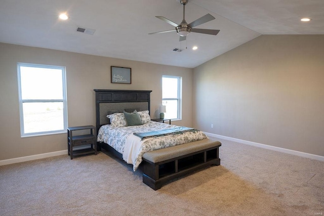 carpeted bedroom featuring vaulted ceiling and ceiling fan