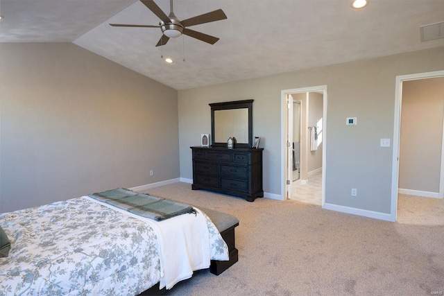 bedroom with light colored carpet, vaulted ceiling, and ceiling fan