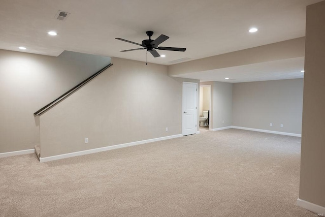 interior space with ceiling fan