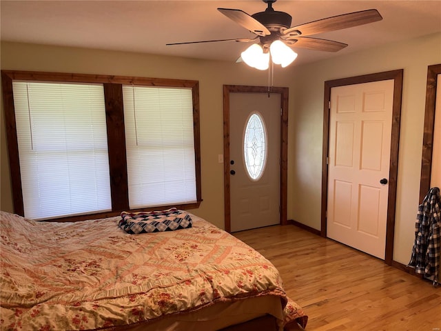 bedroom featuring light hardwood / wood-style floors and ceiling fan