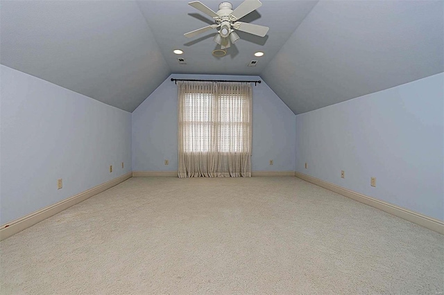 bonus room featuring light carpet, lofted ceiling, and ceiling fan