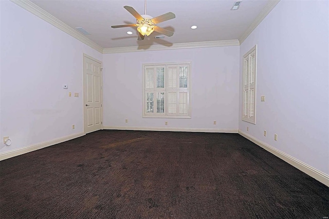 empty room with dark carpet, crown molding, and ceiling fan