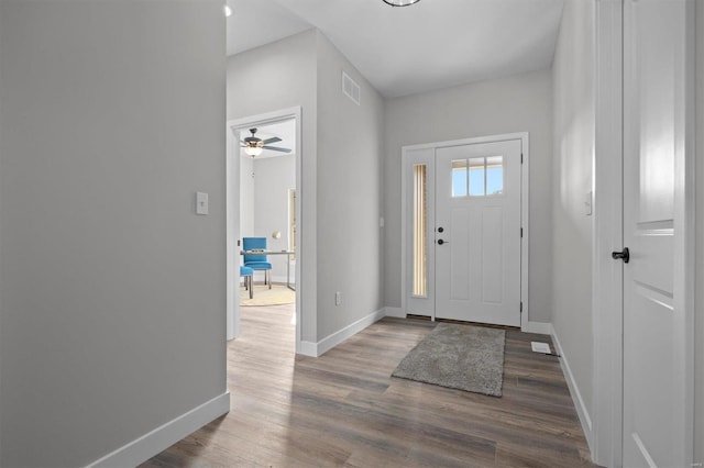 foyer entrance featuring ceiling fan and hardwood / wood-style floors