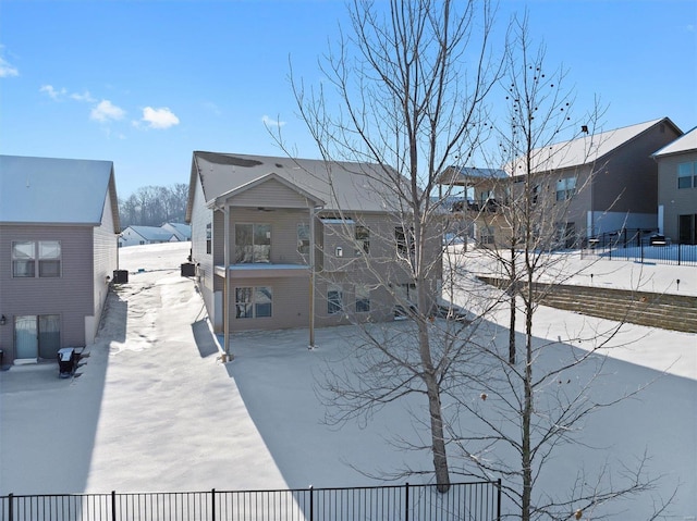 view of snow covered property