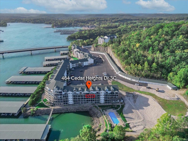 birds eye view of property featuring a water view