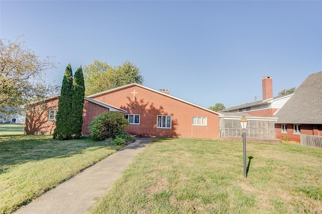 view of property exterior featuring a yard