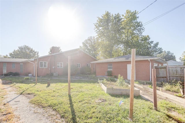 exterior space with a front lawn