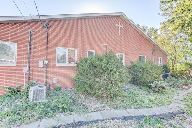 view of property exterior featuring central AC unit