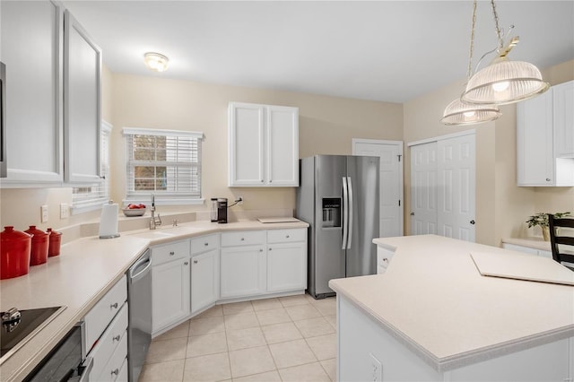 kitchen featuring white cabinetry, sink, and stainless steel appliances