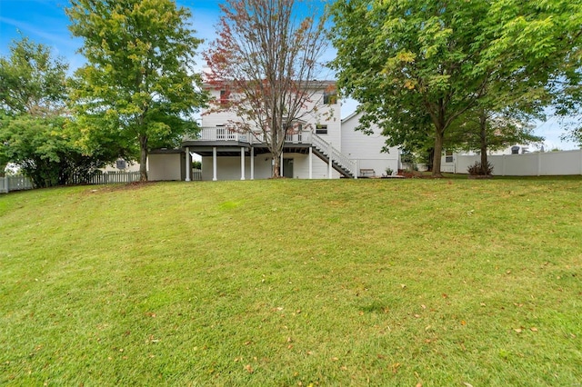 view of yard with a wooden deck