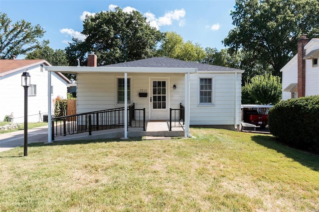 view of front of property with a front lawn and a porch