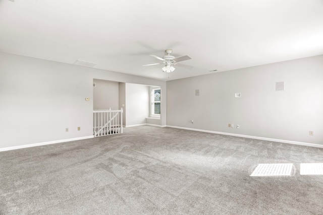 carpeted empty room with ceiling fan