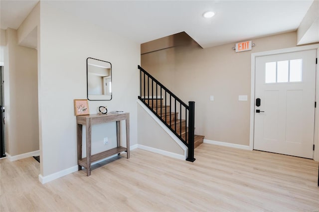 entrance foyer with light hardwood / wood-style floors