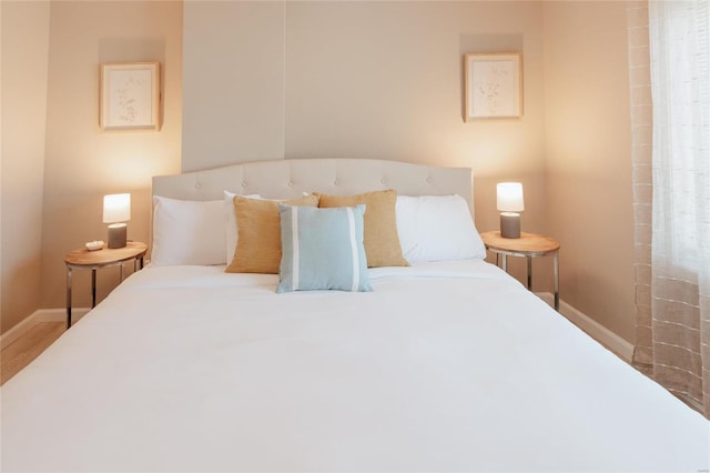 bedroom featuring hardwood / wood-style flooring