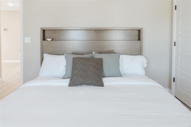 bedroom featuring hardwood / wood-style flooring