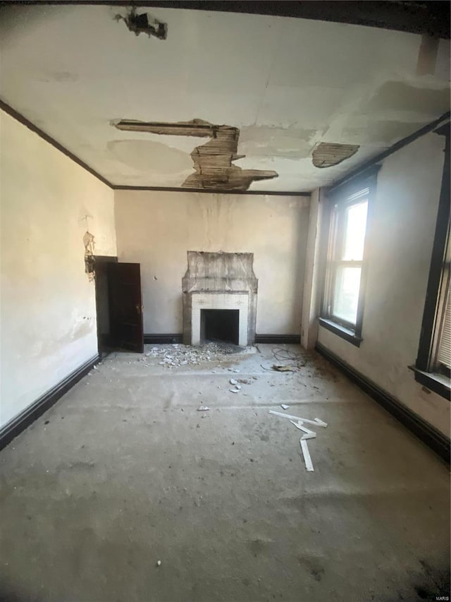 unfurnished living room featuring a fireplace