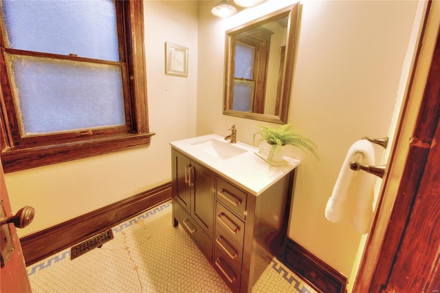 bathroom featuring vanity and tile patterned flooring