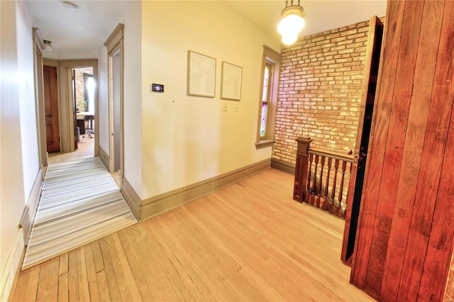 corridor featuring light hardwood / wood-style floors