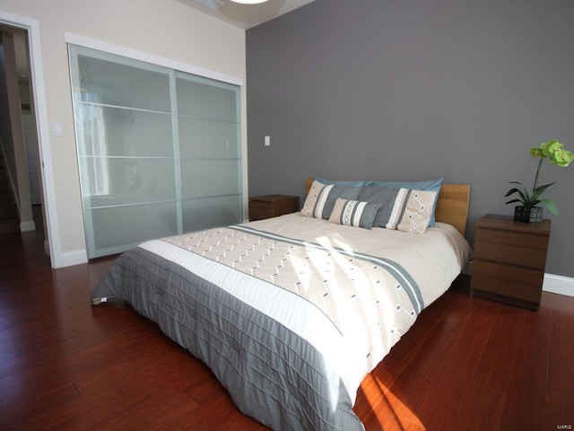 bedroom featuring dark hardwood / wood-style floors