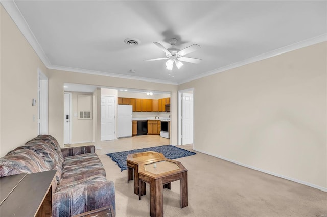 living room with light carpet, ornamental molding, and ceiling fan