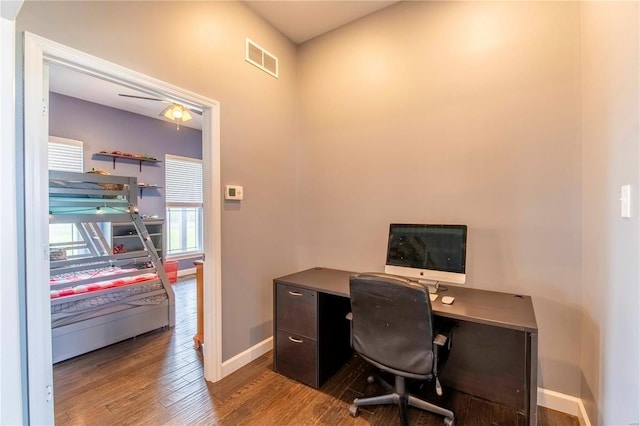 office with hardwood / wood-style floors and ceiling fan