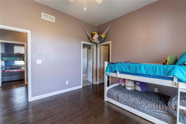 bedroom featuring dark wood-type flooring and ceiling fan