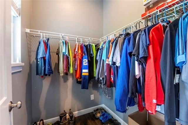 spacious closet featuring hardwood / wood-style floors