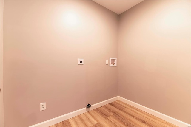 washroom featuring electric dryer hookup, hardwood / wood-style flooring, and hookup for a washing machine