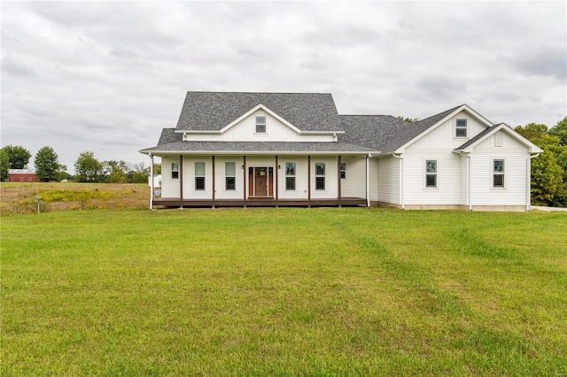 view of front facade featuring a porch and a front lawn