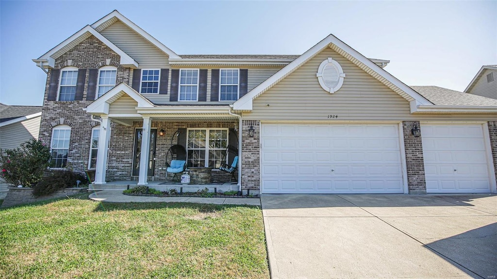 view of front of property with a front lawn and a porch