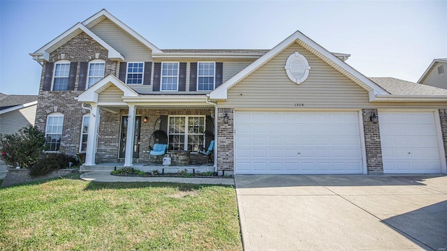 view of front of property with a front lawn and a porch